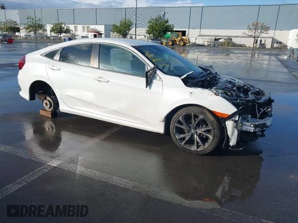 2019 Honda Civic Sport with VIN 19XFC2F86KE215368, listed as a IAAI auction lot 41934715 with 50,253 mi miles and . Bid and sale history available at DreamBid. Image 1.
