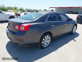2013 Chevrolet Malibu LTZ with VIN 1G11H5SA7DF281662, listed as a IAAI auction lot 41998123 with 52,664 mi miles. Bid and sale history available at carsss.com. Image 4.