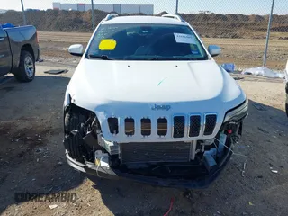 2020 Jeep Cherokee Latitude with VIN 1C4PJLCB2LD629458, listed as a IAAI auction lot 41616505 with 55,651 mi miles. Bid and sale history available at carsss.com. Image 12.
