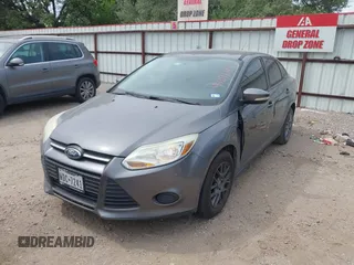2013 Ford Focus SE z VIN 1FADP3F23DL159239, wystawiony jako IAAI lot #42076471 z przebiegiem 111 346 mil mil oraz . Historia ofert i sprzedaży dostępna na DreamBid. Obrazek 2.