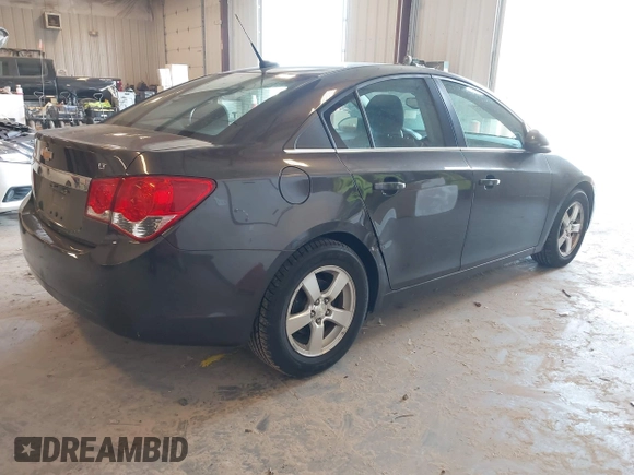 2014 Chevrolet Cruze 1LT with VIN 1G1PC5SB1E7258259, listed as a IAAI auction lot 42143073 with 101,687 mi miles and . Bid and sale history available at DreamBid. Image 4.