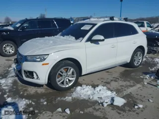 2020 Audi Q5 Premium with VIN WA1ANAFY4L2063453, listed as a IAAI auction lot 41334895 with 97,274 mi miles. Bid and sale history available at carsss.com. Image 2.