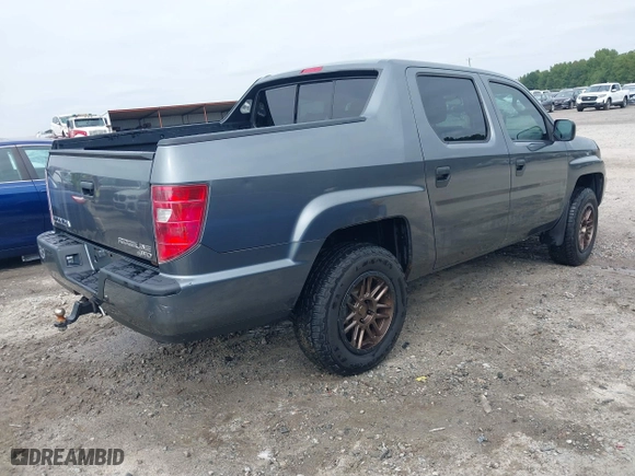 2010 Honda Ridgeline RT with VIN 5FPYK1F28AB010815, listed as a IAAI auction lot 40405105 with 275,762 mi miles. Bid and sale history available at carsss.com. Image 4.