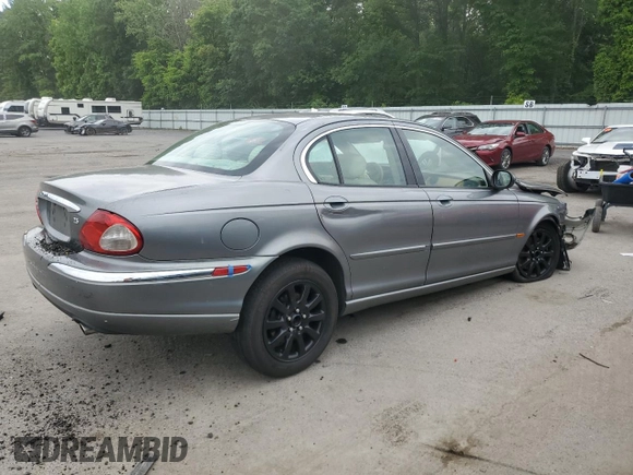 2003 Jaguar X-Type z VIN SAJEB52D33XD54978, wystawiony jako Copart lot #58027805 z przebiegiem Nie podano mil oraz Szkoda całkowita • Salvage title. Historia ofert i sprzedaży dostępna na DreamBid. Obrazek 3.