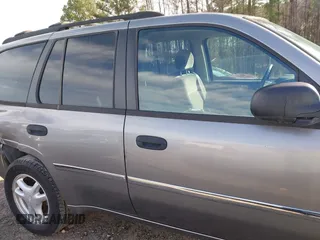 2007 GMC Envoy SLE with VIN 1GKDS13S372241844, listed as a IAAI auction lot 41575443 with 144,726 mi miles. Bid and sale history available at carsss.com. Image 13.