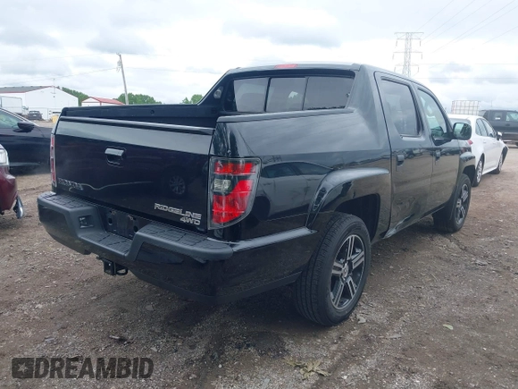 2013 Honda Ridgeline Sport with VIN 5FPYK1F73DB016232, listed as a IAAI auction lot 42330362 with 214,668 mi miles and . Bid and sale history available at DreamBid. Image 4.