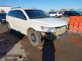 2017 Dodge Journey SE z VIN 3C4PDCAB3HT707029, wystawiony jako IAAI lot #41406306 z przebiegiem 104 046 mil mil oraz . Historia ofert i sprzedaży dostępna na DreamBid. Obrazek 1.