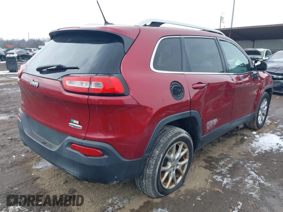 2014 Jeep Cherokee Latitude with VIN 1C4PJMCS2EW175306, listed as a IAAI auction lot 41620115 with 156,578 mi miles and . Bid and sale history available at carsss.com. Image 4.