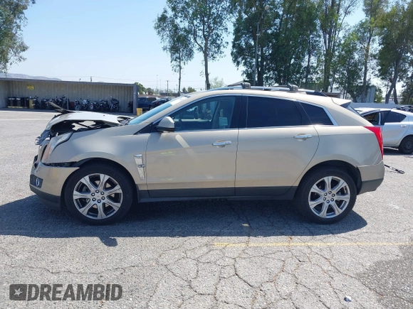 2011 Cadillac SRX Premium Collection z VIN 3GYFNCEY3BS506360, wystawiony jako IAAI lot #42096225 z przebiegiem 173 514 mil mil oraz . Historia ofert i sprzedaży dostępna na DreamBid. Obrazek 14.