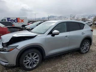 2021 Mazda CX-5 Grand Touring with VIN JM3KFBDM1M1403699, listed as a Copart auction lot 49888655 with 29,919 mi miles and Salvage Title. Bid and sale history available at carsss.com. Image 1.