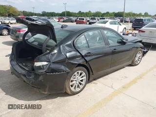 2018 BMW 3 Series 320i xDrive with VIN WBA8E5G53JNU45708, listed as a IAAI auction lot 41865092 with 88,720 mi miles. Bid and sale history available at carsss.com. Image 4.