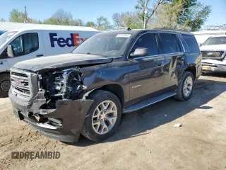 2015 GMC Yukon SLT z VIN 1GKS2BKC9FR147397, wystawiony jako Copart lot #53157845 z przebiegiem 131 552 mil mil oraz Szkoda całkowita • Salvage title. Historia ofert i sprzedaży dostępna na DreamBid. Obrazek 1.