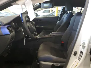 2022 Toyota C-HR XLE z VIN NMTKHMBX3NR146382, wystawiony jako Copart lot #55765105 z przebiegiem 32 052 mil mil oraz Szkoda całkowita • Salvage title. Historia ofert i sprzedaży dostępna na DreamBid. Obrazek 7.
