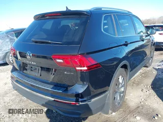 2023 Volkswagen Tiguan SE z VIN 3VVMB7AX7PM032629, wystawiony jako IAAI lot #41441468 z przebiegiem 52 518 mil mil oraz . Historia ofert i sprzedaży dostępna na DreamBid. Obrazek 4.