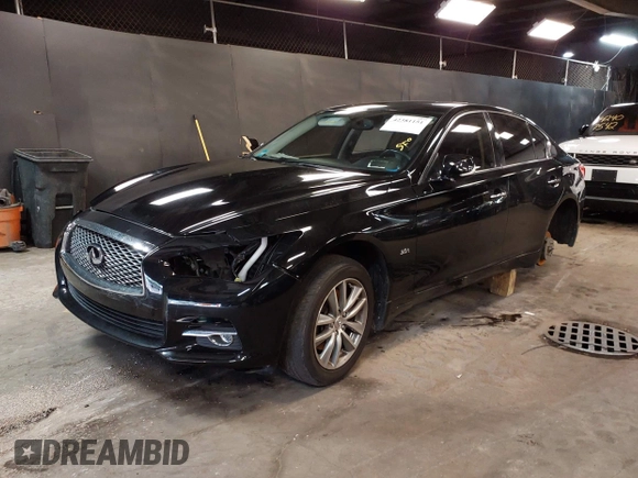 2017 Infiniti Q50 Premium z VIN JN1EV7AR7HM834870, wystawiony jako IAAI lot #42381151 z przebiegiem 89 438 mil mil oraz . Historia ofert i sprzedaży dostępna na DreamBid. Obrazek 18.