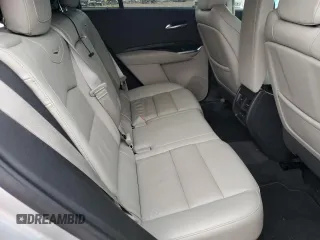 2021 Cadillac XT4 FWD Premium Luxury with VIN 1GYFZCR48MF083164, listed as a Copart auction lot 55377235 with 63,987 mi miles and Salvage title. Bid and sale history available at DreamBid. Image 11.