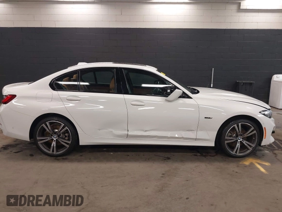 2023 BMW 3 Series 330e xDrive with VIN 3MW39FS05P8D20575, listed as a IAAI auction lot 42076033 with 10,875 mi miles. Bid and sale history available at carsss.com. Image 13.