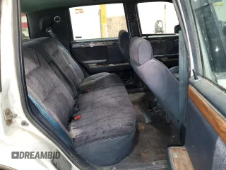 1992 Dodge Dynasty LE z VIN 1B3XC56RXND822802, wystawiony jako Copart lot #82799714 z przebiegiem 137 131 mil mil oraz Szkoda całkowita • Salvage title. Historia ofert i sprzedaży dostępna na DreamBid. Obrazek 10.