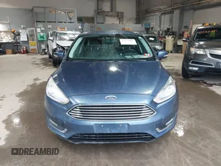 2018 Ford Focus Titanium with VIN 1FADP3N29JL242428, listed as a IAAI auction lot 42323967 with 200,662 mi miles and . Bid and sale history available at DreamBid. Image 12.