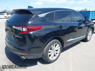 2021 Acura RDX with VIN 5J8TC1H33ML006504, listed as a IAAI auction lot 41933576 with 77,045 mi miles. Bid and sale history available at carsss.com. Image 4.