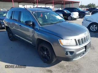 2011 Jeep Compass with VIN 1J4NT1FA0BD246586, listed as a IAAI auction lot 41253630 with 120,540 mi miles. Bid and sale history available at carsss.com. Image 1.