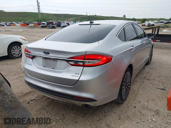 2017 Ford Fusion SE z VIN 3FA6P0HD5HR166433, wystawiony jako IAAI lot #42394998 z przebiegiem 121 333 mil mil oraz . Historia ofert i sprzedaży dostępna na DreamBid. Obrazek 4.