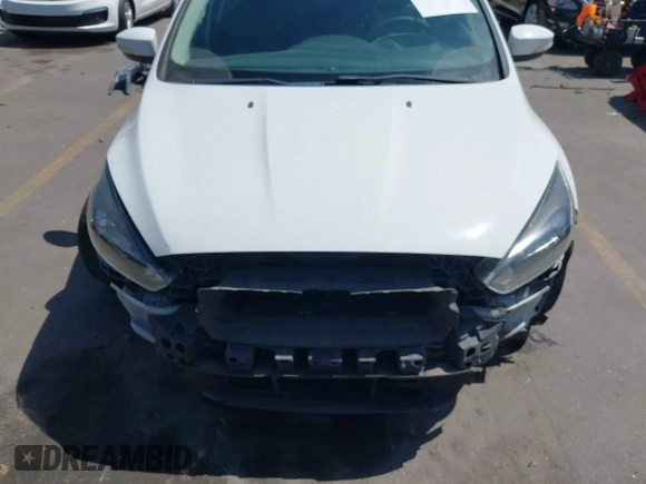 2017 Ford Focus SE with VIN 1FADP3F24HL232527, listed as a IAAI auction lot 42110702 with 95,327 mi miles and . Bid and sale history available at DreamBid. Image 13.