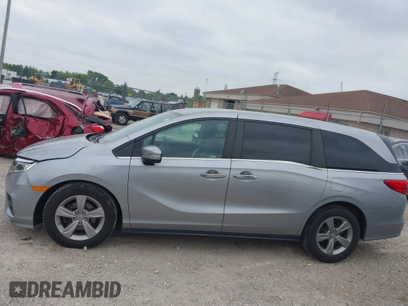 2019 Honda Odyssey EX with VIN 5FNRL6H53KB129212, listed as a IAAI auction lot 42474440 with 142,431 mi miles and . Bid and sale history available at DreamBid. Image 14.
