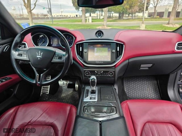 2014 Maserati Ghibli S Q4 with VIN ZAM57RTA7E1089301, listed as a Copart auction lot 54070585 with 59,787 mi miles and Salvage Title. Bid and sale history available at carsss.com. Image 9.