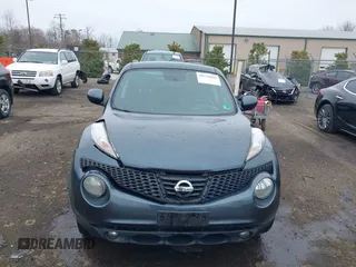 2013 Nissan Juke S with VIN JN8AF5MV7DT209881, listed as a IAAI auction lot 41728623 with 185,296 mi miles and . Bid and sale history available at DreamBid. Image 12.
