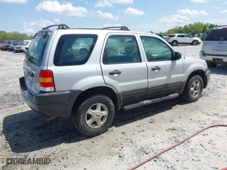 2003 Ford Escape XLS Popular with VIN 1FMYU02183KC05213, listed as a IAAI auction lot 41955134 with 305,524 mi miles. Bid and sale history available at carsss.com. Image 4.