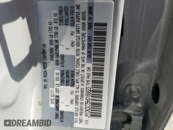 2017 Mazda CX-3 Touring z VIN JM1DKDC75H0168823, wystawiony jako Copart lot #57968955 z przebiegiem 116 231 mil mil oraz Szkoda całkowita • Salvage title. Historia ofert i sprzedaży dostępna na DreamBid. Obrazek 13.