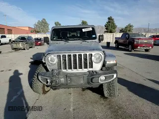2021 Jeep Gladiator Sport S z VIN 1C6JJTAM1ML508266, wystawiony jako Copart lot #45349555 z przebiegiem 47 883 mil mil oraz Szkoda całkowita • Salvage title. Historia ofert i sprzedaży dostępna na DreamBid. Obrazek 10.