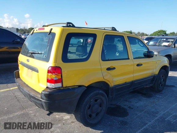 2002 Ford Escape XLS Choice with VIN 1FMYU01132KD56671, listed as a IAAI auction lot 41552541 with 245,923 mi miles and . Bid and sale history available at DreamBid. Image 6.