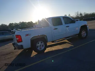 2011 Chevrolet Silverado 1500 LT with VIN 3GCPCSE0XBG179219, listed as a IAAI auction lot 41769270 with 115,226 mi miles and . Bid and sale history available at DreamBid. Image 4.