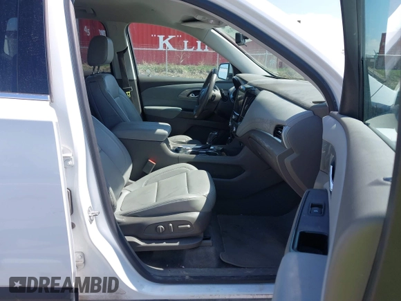 2018 Chevrolet Traverse LT z VIN 1GNEVHKW3JJ125861, wystawiony jako IAAI lot #41876184 z przebiegiem 95 223 mil mil oraz . Historia ofert i sprzedaży dostępna na DreamBid. Obrazek 5.
