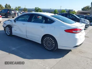2017 Ford Fusion Hybrid Titanium с VIN 3FA6P0RU3HR323164, выставлен на аукционе IAAI как лот 42303571 с пробегом 119 732 миль миль и . История ставок и продаж доступна на DreamBid. Изображение 3.