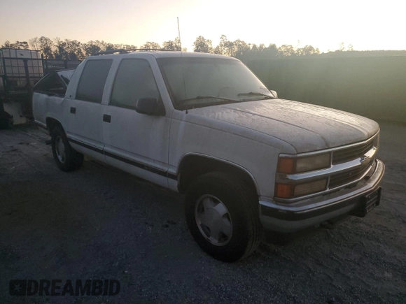 1996 Chevrolet Suburban z VIN 3GNFK16R7TG124404, wystawiony jako Copart lot #77361264 z przebiegiem 256 935 mil mil oraz Szkoda całkowita • Salvage title. Historia ofert i sprzedaży dostępna na DreamBid. Obrazek 4.