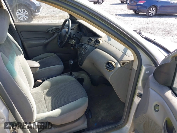 2003 Ford Focus SE z VIN 1FAFP34Z23W257426, wystawiony jako IAAI lot #40736207 z przebiegiem 87 447 mil mil oraz . Historia ofert i sprzedaży dostępna na DreamBid. Obrazek 5.