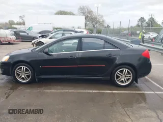 2009 Pontiac G6 1SB with VIN 1G2ZJ57B594263412, listed as a IAAI auction lot 41844953 with 234,057 mi miles and . Bid and sale history available at DreamBid. Image 14.