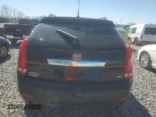 2014 Cadillac SRX Performance Collection z VIN 3GYFNFE31ES664836, wystawiony jako Copart lot #50315595 z przebiegiem 11 597 mil mil oraz Czysty tytuł • Clean title. Historia ofert i sprzedaży dostępna na DreamBid. Obrazek 6.