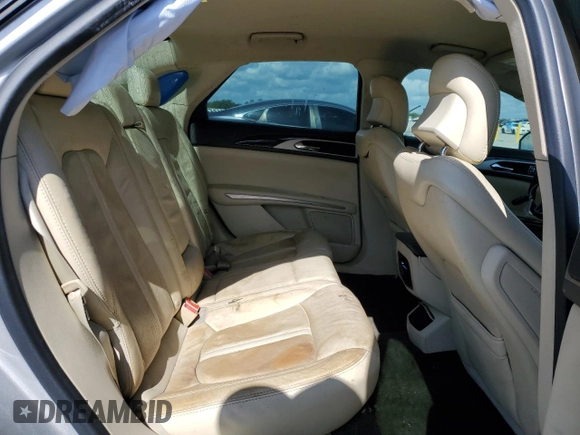 2013 Lincoln MKZ z VIN 3LN6L2G94DR820729, wystawiony jako Copart lot #53243145 z przebiegiem 111 753 mil mil oraz Szkoda całkowita • Salvage title. Historia ofert i sprzedaży dostępna na DreamBid. Obrazek 10.