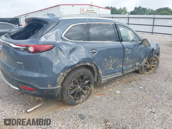 2021 Mazda CX-9 Grand Touring with VIN JM3TCADY2M0509286, listed as a IAAI auction lot 39976279 with 93,588 mi miles and . Bid and sale history available at DreamBid. Image 4.