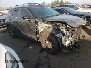 2021 Mazda CX-5 Signature with VIN JM3KFBEY2M0345187, listed as a Copart auction lot 82786984 with 98,014 mi miles and Salvage Title. Bid and sale history available at carsss.com. Image 4.