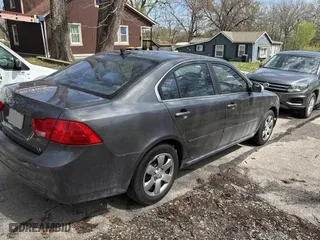 2009 Kia Optima LX with VIN KNAGE228695323268, listed as a Copart auction lot 51813365 with 99,447 mi miles and Clean Title. Bid and sale history available at carsss.com. Image 4.