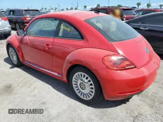 2014 Volkswagen Beetle 2.5L with VIN 3VWJX7AT4EM607425, listed as a Copart auction lot 75714654 with Not provided miles and Non repairable. Bid and sale history available at DreamBid. Image 2.