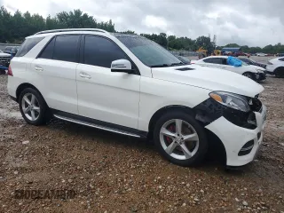 2016 Mercedes-Benz GLE 350 with VIN 4JGDA5HB9GA757934, listed as a Copart auction lot 56551375 with 132,240 mi miles and Salvage title. Bid and sale history available at DreamBid. Image 4.