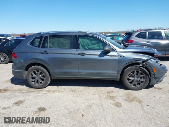 2023 Volkswagen Tiguan SE with VIN 3VV3B7AX5PM142378, listed as a IAAI auction lot 41835204 with 13,670 mi miles and . Bid and sale history available at DreamBid. Image 13.