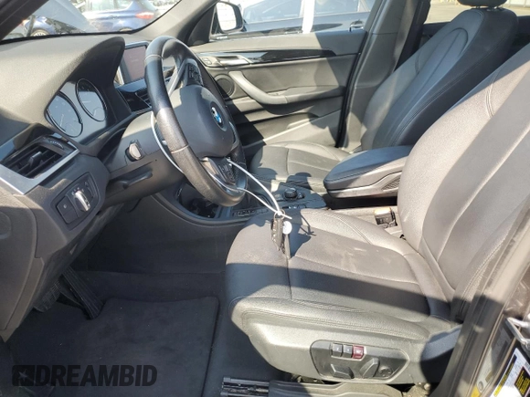 2018 BMW X1 sDrive28i with VIN WBXHU7C35J5L09783, listed as a Copart auction lot 55147935 with 37,114 mi miles and Salvage Title. Bid and sale history available at DreamBid. Image 7.