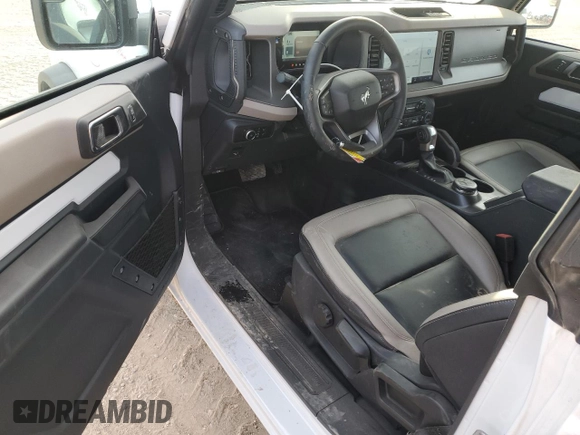 2024 Ford Bronco Big Bend с VIN 1FMDE7AH8RLA93115, выставлен на аукционе Copart как лот 41611185 с пробегом 1 589 миль миль и Списание • Salvage title. История ставок и продаж доступна на DreamBid. Изображение 8.